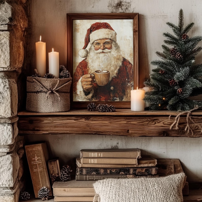 May include: A framed painting of Santa Claus holding a mug of hot chocolate, with candles and a small pine tree on a wooden shelf.