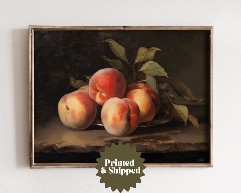 May include: A framed painting of a still life featuring five peaches on a plate with green leaves. The peaches are a mix of red and yellow tones, and the background is a dark brown.