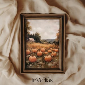 Può includere: Un dipinto incorniciato di un campo di zucche davanti a una fattoria. Le zucche sono arancioni e il campo è verde. La fattoria è marrone e ha un tetto bianco. Il cielo è blu e ci sono nuvole nel cielo.