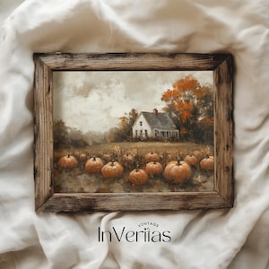 Può includere: Un dipinto incorniciato di una fattoria bianca con un portico, circondata da un campo di zucche. La fattoria è sullo sfondo di un cielo nuvoloso e alcuni alberi con foglie arancioni. Il dipinto è in una cornice di legno rustica.
