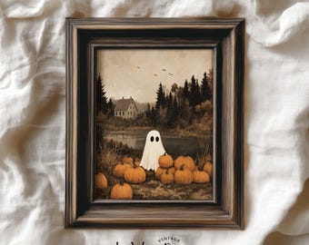 Puede incluir: Lámina artística vintage enmarcada para Halloween. La obra representa un fantasma blanco frente a calabazas, una casa y árboles. El marco es marrón oscuro con un acabado envejecido. El texto "Vintage InVeritas" está en la parte inferior.