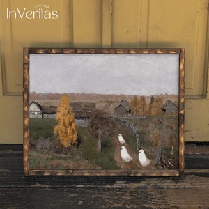 May include: A framed painting of a rural landscape with three white ghosts walking down a path. The painting is set in a fall scene with trees with yellow leaves. The painting is framed in a dark wood frame.