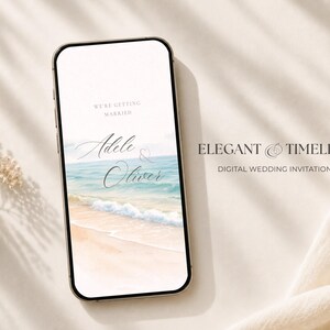 May include: A smartphone displaying a digital wedding invitation with a beach scene featuring ocean waves and sand. The text reads WE'RE GETTING MARRIED, Adele & Oliver, ELEGANT & TIMELESS, and DIGITAL WEDDING INVITATION.