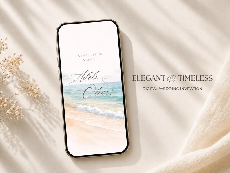 May include: A smartphone displaying a digital wedding invitation with a beach scene featuring ocean waves and sand. The text reads WE'RE GETTING MARRIED, Adele & Oliver, ELEGANT & TIMELESS, and DIGITAL WEDDING INVITATION.