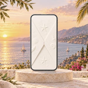 May include: A smartphone displaying a white envelope-style case with embossed seashell and starfish patterns on the back. The case features a central fold design with detailed marine life textures, including various shells and starfish, presented in a clean, off-white finish.
