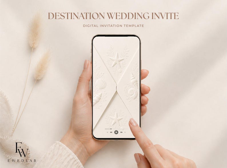 May include: A smartphone displaying a digital wedding invitation template with an off-white envelope design featuring embossed starfish and seashell motifs. The screen shows the text DESTINATION WEDDING INVITE and DIGITAL INVITATION TEMPLATE.