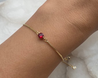 Ruby Red Gold Plated Bracelet With An Adjustable Slider And Dangly Rhinestone Ends, Women's Gift, July Birthstone