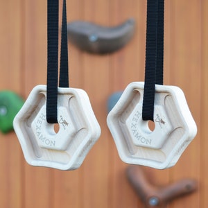 Tabla de escalada portátil Hangboard HEXAMON con 6 bolsillos de profundidad y correas ajustables, herramienta para fortalecer los dedos de Gripnatic