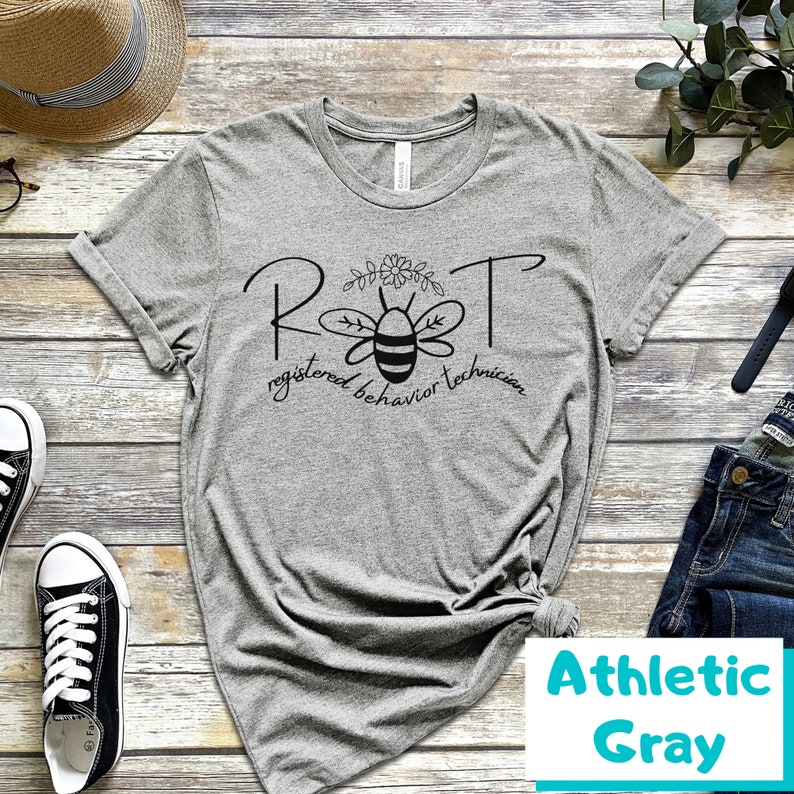 May include: Gray t-shirt with a bee graphic and the text "RBT registered behavior technician".