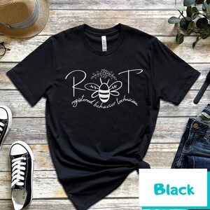 May include: Black t-shirt with a white bee graphic and the text "RBT registered behavior technician".