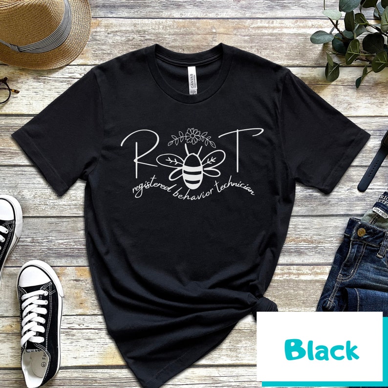 May include: Black t-shirt with a white bee graphic and the text "RBT registered behavior technician".