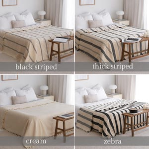 May include: Four different styles of striped throw blankets on beds with wooden side tables. The blankets are cream, black striped, thick striped, and zebra.