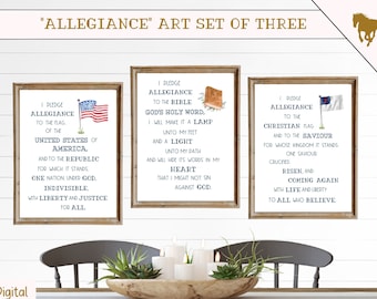 May include: Three printable wall art prints with a rustic wood frame. Each print features a different patriotic design with text that reads "I pledge allegiance to the flag of the United States of America, and to the republic for which it stands, one nation under God, indivisible, with liberty and justice for all."  "I pledge allegiance to the Bible, God's Holy Word, I will make it a lamp unto my feet and a light unto my path and will hide its words in my heart that I might not sin against God."  "I pledge allegiance to the Christian flag and to the Saviour for whose kingdom it stands, one Saviour crucified, risen, and coming again with life and liberty to all who believe."