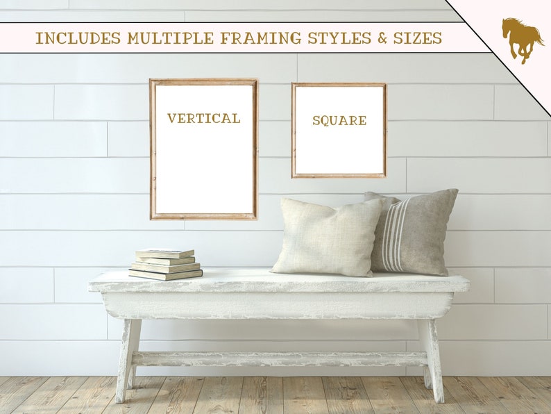 May include: Two wood framed prints, one vertical and one square, hanging on a white shiplap wall. The prints are blank and the frames are a light brown color. A white bench with two pillows sits in front of the prints.