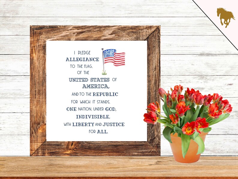 May include: A framed print with the Pledge of Allegiance text and an American flag illustration. The text reads "I pledge allegiance to the flag, of the United States of America, and to the republic for which it stands, one nation, under God, indivisible, with liberty and justice for all."