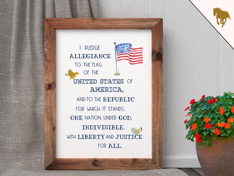 May include: A framed print featuring the Pledge of Allegiance to the United States of America. The print includes a watercolour illustration of the American flag and two birds.