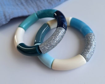 Bracelet jonc élastique en perles tubes incurvés acrylique bleu et glitter argenté