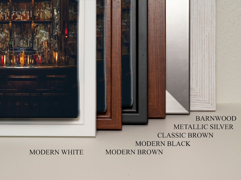 May include: A close-up of six different picture frames, each with a different color and style. The frames are arranged from left to right, with the modern white frame on the left and the barnwood frame on the right. The frames are all made of wood and have a variety of finishes, including white, brown, black, and silver. The frames are all in focus and the image is well-lit.
