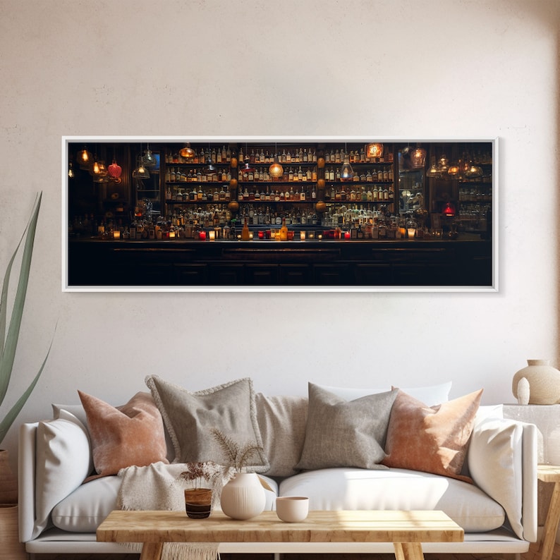 May include: A dimly lit bar with a long wooden counter and shelves stocked with bottles of liquor. The bar is decorated with hanging lights and candles.