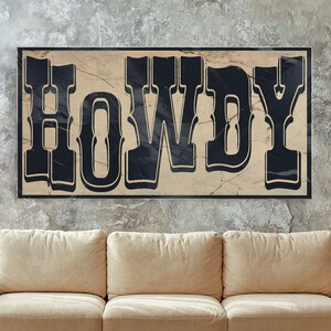 May include: A black and white sign with the word "HOWDY" in a vintage, western-style font. The sign is on a beige background with a marble-like texture.