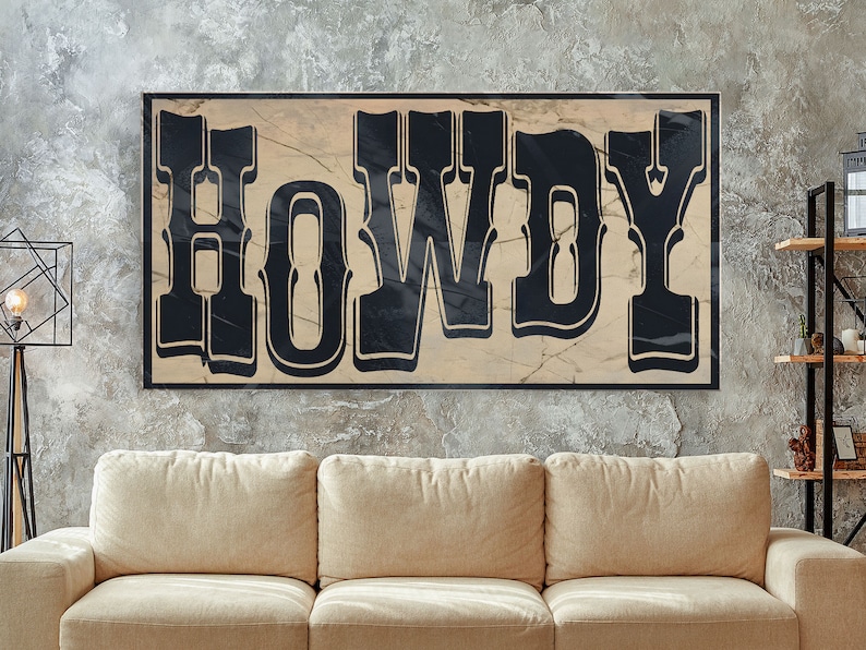 May include: A black and white sign with the word "HOWDY" in a vintage, western-style font. The sign is on a beige background with a marble-like texture.