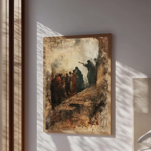 May include: A framed painting with a religious theme. The artwork depicts a group of figures in dark robes, with one figure pointing upwards. The color palette is dominated by browns, reds, and blacks, creating a dramatic effect.