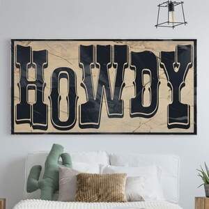 May include: A rustic wooden sign with the word "HOWDY" in black lettering. The sign has a distressed, vintage look and is perfect for adding a touch of Western charm to any home.