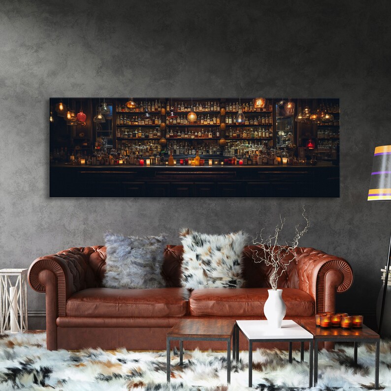 May include: A panoramic photograph of a dimly lit bar with shelves stocked with bottles of liquor. The bar is lit with warm, yellow lights and has a dark wood countertop. The bar is empty, but there are several empty glasses on the counter.