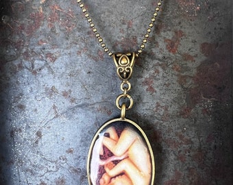 Fetus necklace