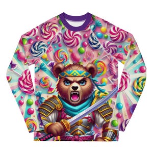May include: A long-sleeved shirt with a colorful candy pattern. A cartoon bear wearing a samurai outfit and holding a sword is in the center of the shirt.