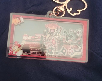 Llavero con forma de coctelera del hotel Hazbin