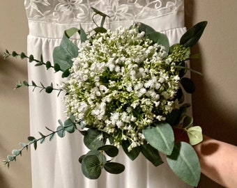 Bridal and bridesmaid bouquet - classic romance, minimalist style with babys breath encased in gorgeous eucalyptus.