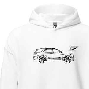 Peut inclure: Sweat à capuche blanc avec un dessin au trait noir d'une voiture et les lettres "ST". Le sweat à capuche a une capuche et une poche avant.