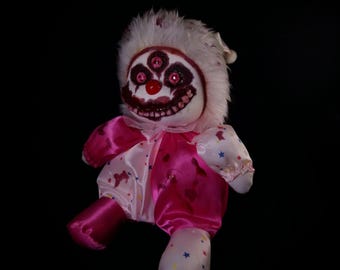 Creepy horror poter clown music box from 1986 moving head disturbing spooky haunted stuffed animal shocking frightening plushie toy phobia