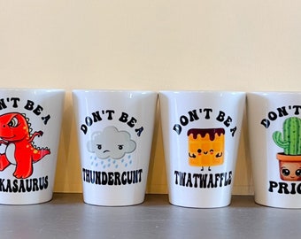 Shot glass set. Don’t be a twatwaffle, dickasaurus, cuntcake, prick, thundercunt, hippo.