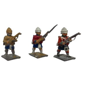May include: Three toy soldiers wearing red and white uniforms with white hats and holding rifles. The soldiers are standing on a gray base.