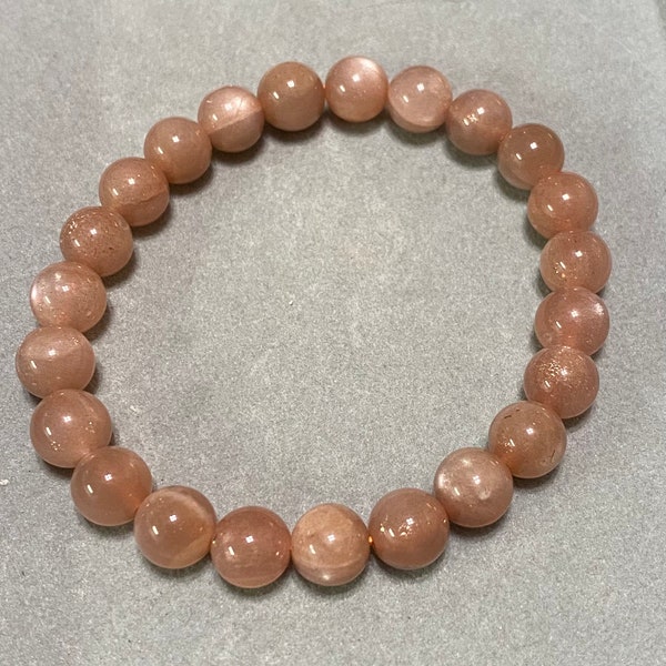 Handmade 8mm Peach Moonstone gemstone stretch bracelet.