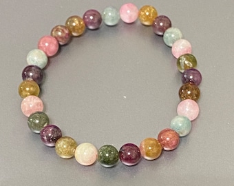 Handmade 6.7mm (Dark) or 6.7mm - 7mm (Light) Watermelon Tourmaline gemstone stretch bracelet.