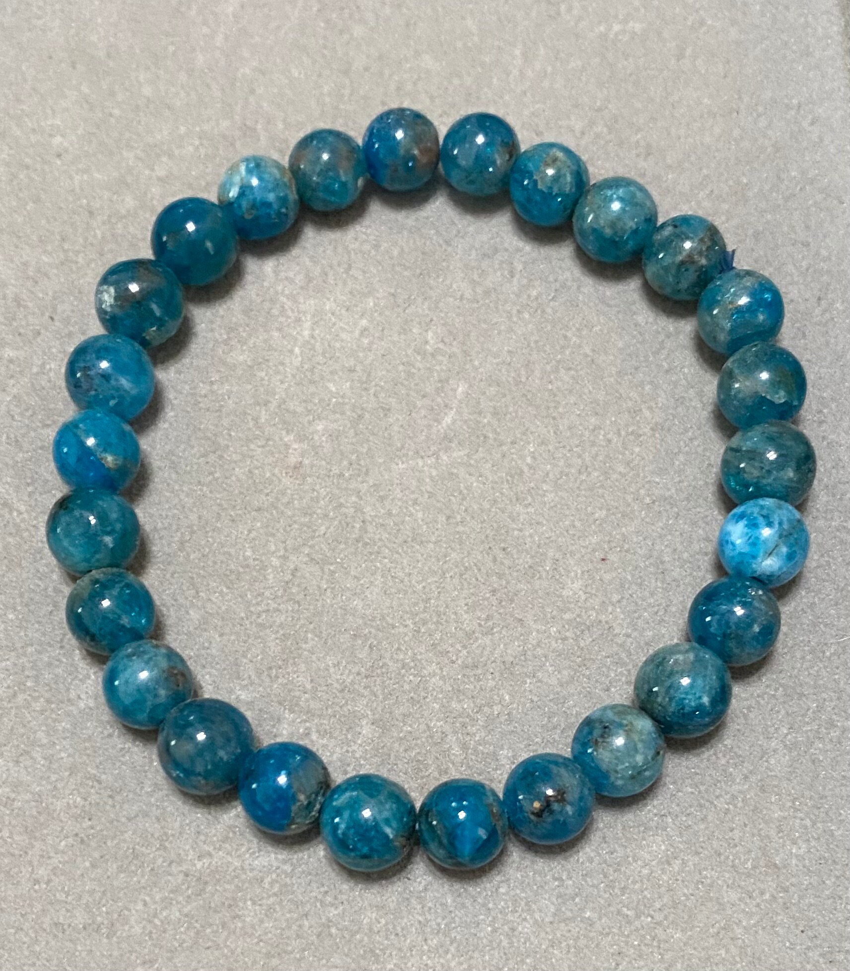 Handmade 6.5mm, 7mm, 7.5mm and 8.7mm Apatite gemstone stretch bracelet, 7" length.