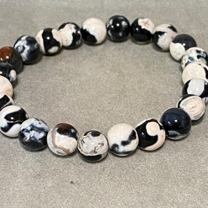 Handmade 8mm Orca Agate gemstone stretch bracelet.
