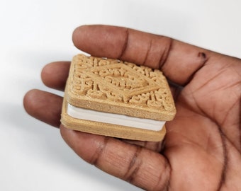 Juguete antiestrés de galleta con crema pastelera: juguete antiestrés de plástico PLA