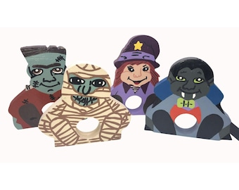 Set van 4 handbeschilderde houten servethouders met Halloween-thema: heks, Frankenstein's monster, mummie en vampier. Vintage verzamelobject.