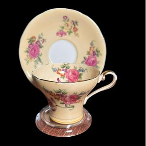 Rare Aynsley Yellow and Floral Corset Cup and Saucer Bone China Made in England 2 3/4 inches high and 3 1/2 inches across #35