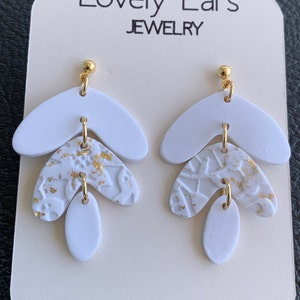 White Leaf Dangle Earrings With Golden Flakes
