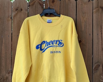 Sudadera vintage 1990 Cheers Boston talla XL de Lee Heavyweight hecha en EE. UU. RN14666, jersey amarillo/azul, clásico vintage, años 90.