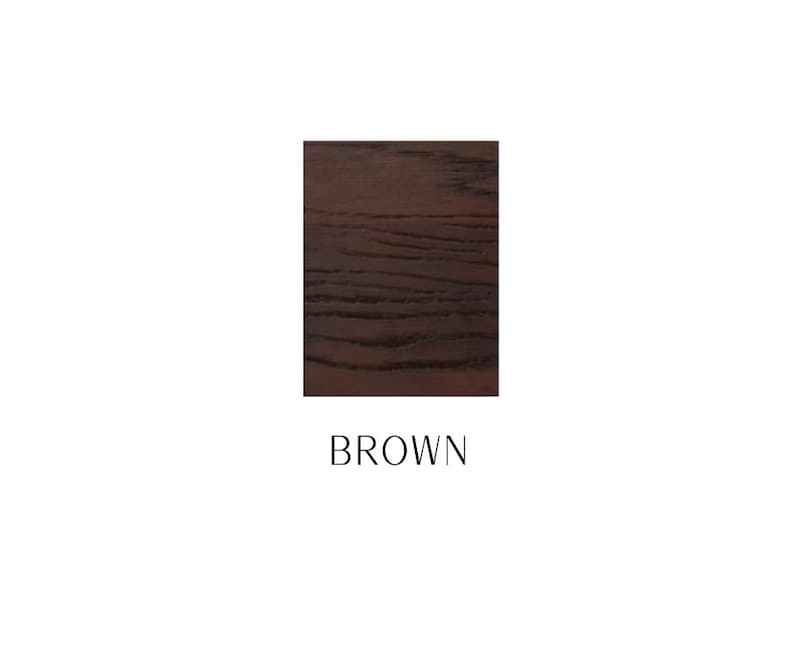 May include: A square swatch of dark brown wood featuring a visible, horizontal grain pattern. Below the square, the word BROWN is printed in a simple, black, sans-serif font. The overall presentation is clean, clear, and focused on the color.