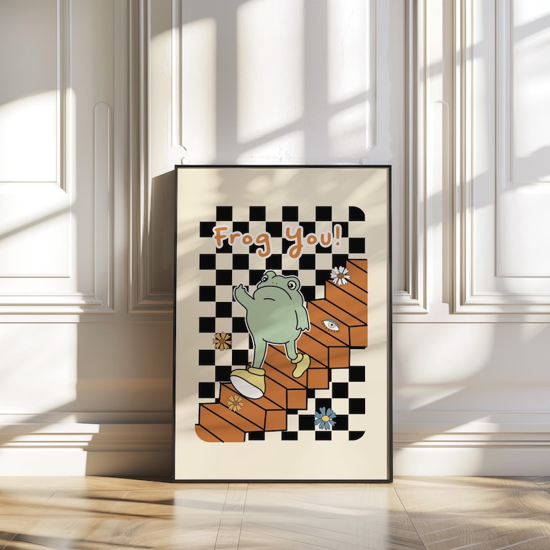 May include: A retro-style illustration of a green frog wearing shoes and walking up a set of orange stairs. The stairs are on a black and white checkered background. The text "Frog You!" is above the frog.