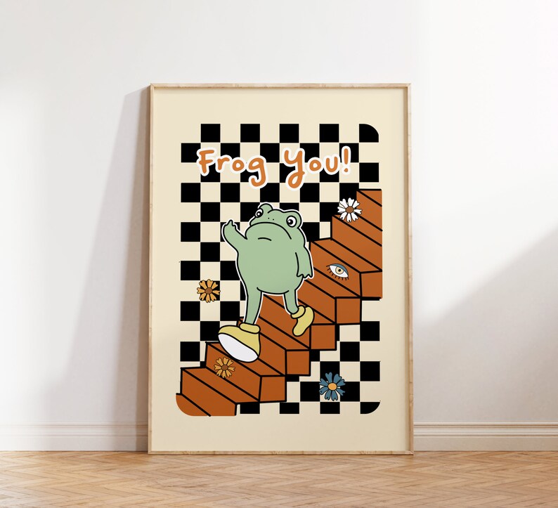 May include: A green frog wearing yellow shoes walks up a set of orange stairs with a black and white chequered background. The text "Frog you!" is written in orange letters at the top of the image.