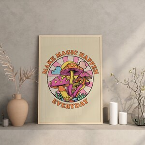 May include: A beige poster with a colorful illustration of mushrooms and the text "Make Magic Happen Everyday".