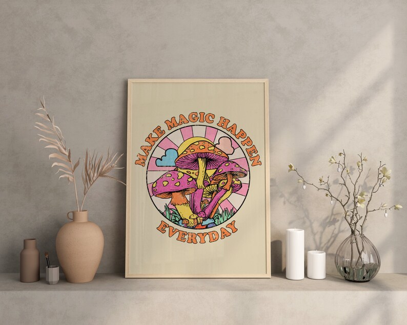 May include: A beige poster with a colorful illustration of mushrooms and the text "Make Magic Happen Everyday".